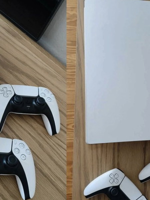 PlayStation 5 like new with 8 games and 2 controllers