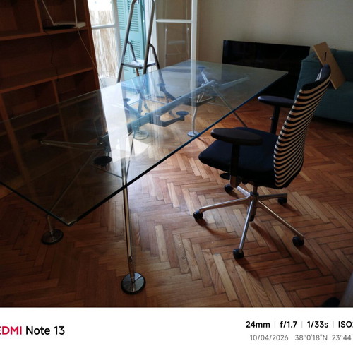 crystal table deloudis and Italian office chair