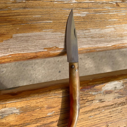 Handmade small folding knife used without blade lock