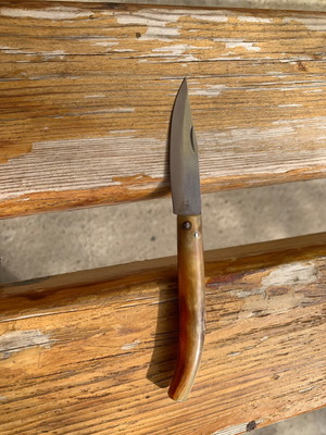 Handmade small folding knife used without blade lock