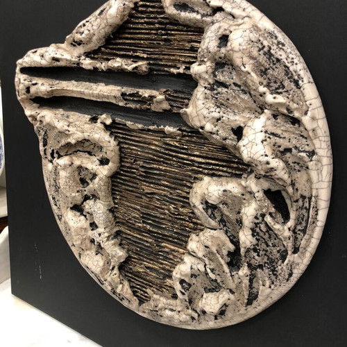 Wall ceramic sculpture used, moon on black wooden panel