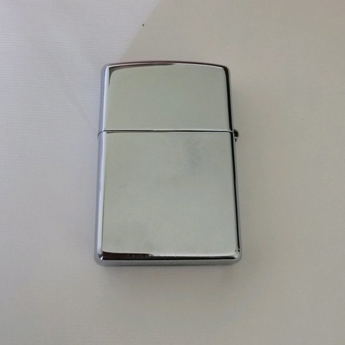 Zippo lighter used with engraved Greek map design