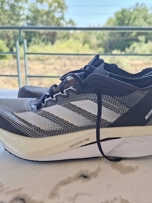 Adidas Adizero Boston12 Lightstrike Pro running shoes like new, unisex