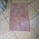 Bath mat used, lightly worn