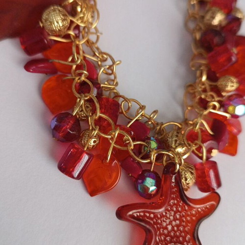 Summer bracelet with red charms, gold, handmade