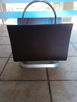 Walnut wood magazine rack in brown color like new