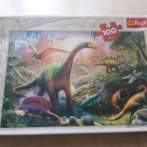Dinosaur puzzles like new, 75 and 100 pieces