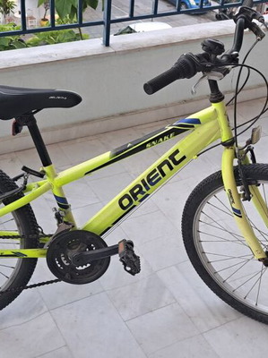 Ποδήλατο Orient Snake 24" μεταχειρισμένο σαν καινούργιο, V-Brakes, 21 ταχύτητες, κίτρινο