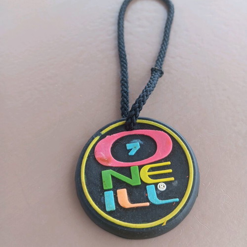 O'Neil collectible keychain like new, 80s decade