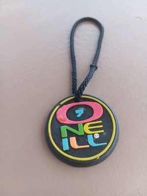 O'Neil collectible keychain like new, 80s decade