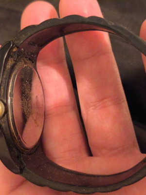 Black wristwatch used, needs battery