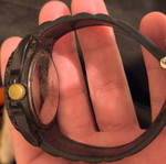 Black wristwatch used, needs battery