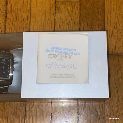 DKNY Vintage men's watch used, gray, with original box and papers
