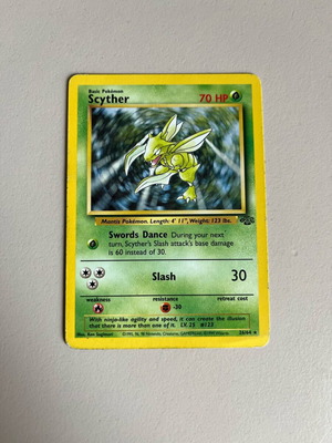 Scyther 24/64 JU used, with signs of wear