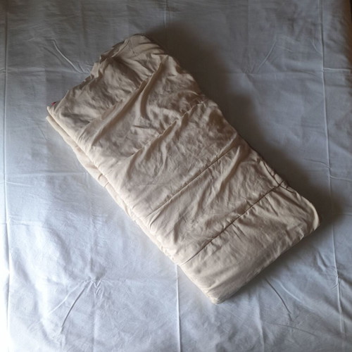 Single bed quilt used, reversible beige and red