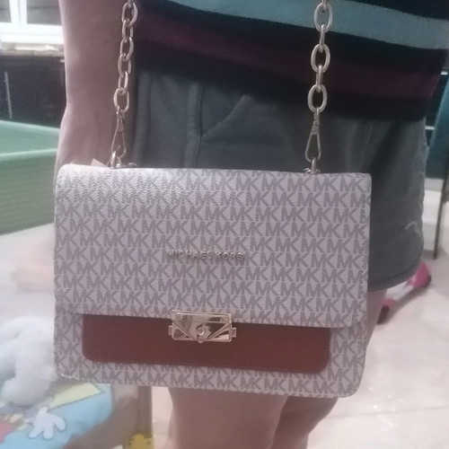 Shoulder bag used with strap for hand and shoulder