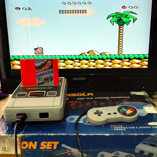 Retro game console used, complete with cartridge and controller
