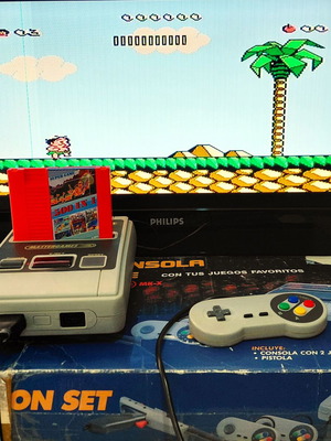 Retro game console used, complete with cartridge and controller
