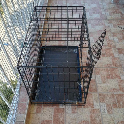 Pet crate used, size M, black with 2 doors