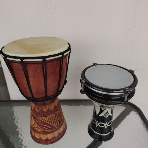 Ethnic percussion set used: Wooden Djembe and Darbuka tambourine mini