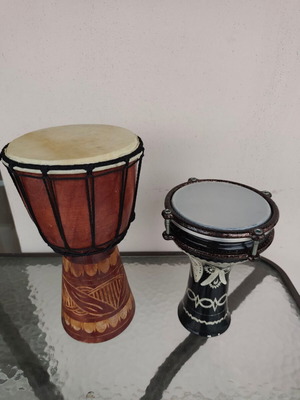 Ethnic percussion set used: Wooden Djembe and Darbuka tambourine mini