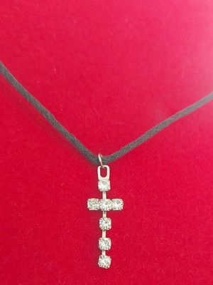 Strass cross with black cord like new