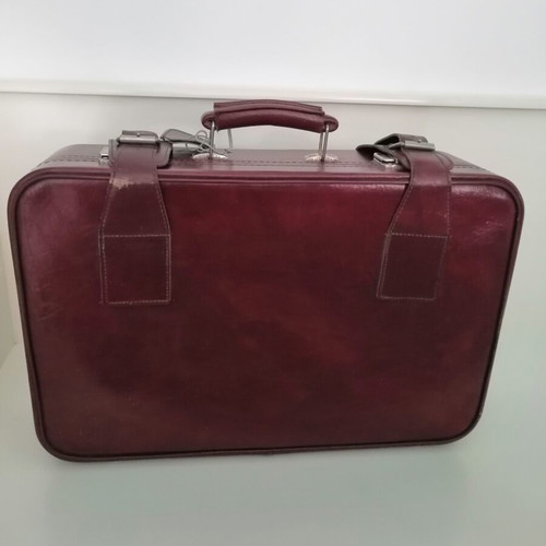 Vintage suitcase used, burgundy color, 1970s with metal clasps
