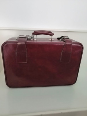Vintage suitcase used, burgundy color, 1970s with metal clasps
