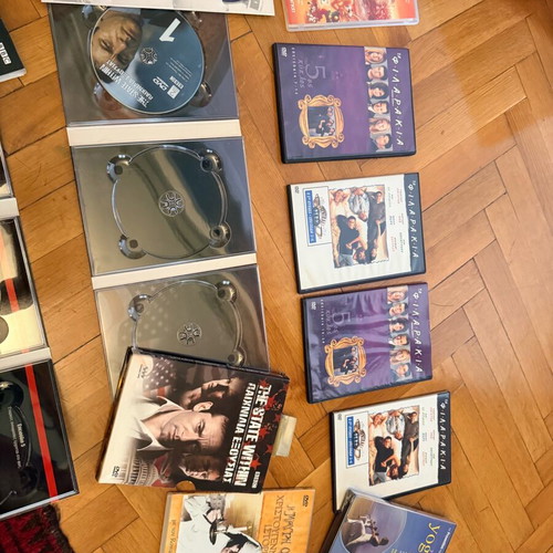 Mixed DVD collection used with series, documentaries, Greek editions