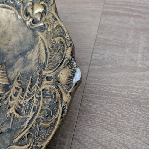 Decorative ceramic plate used with embossed design