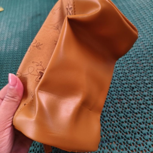 Women's cosmetic bag with floral punch-out design, synthetic leather, camel