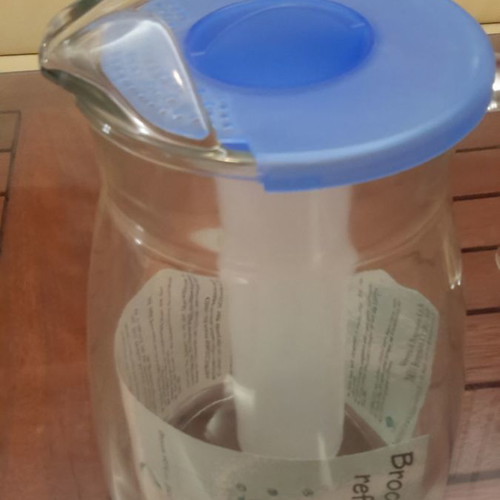 Glass pitcher new with ice compartment