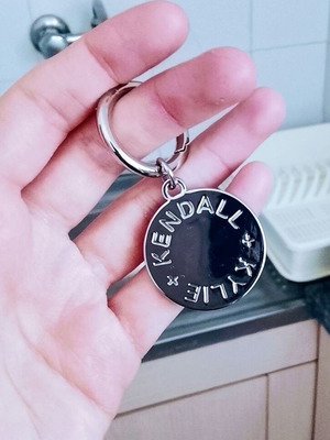 Kendall + Kylie keychain new, steel, silver color