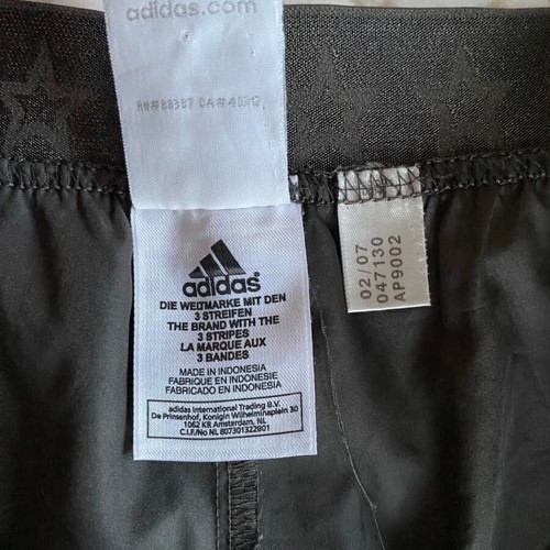 Adidas women's sports shorts used, size M, olive color