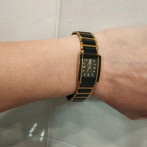 Women's wristwatch used, black and gold, 22cm bracelet