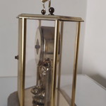 Vintage anniversary table clock with rotating pendulum (80s-90s)