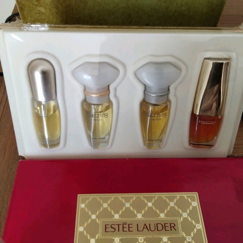 Vintage Estée Lauder collectible set with new mini perfumes