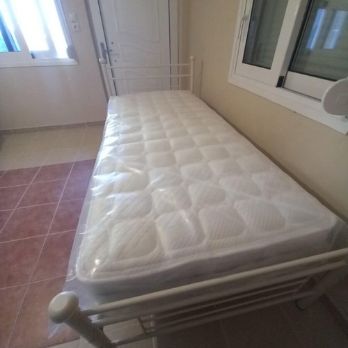 Iron bed new with mattress