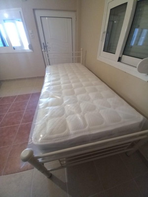 Iron bed new with mattress