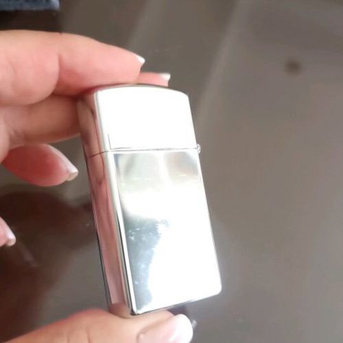 Zippo lighter like new, silver shiny, 90s decade