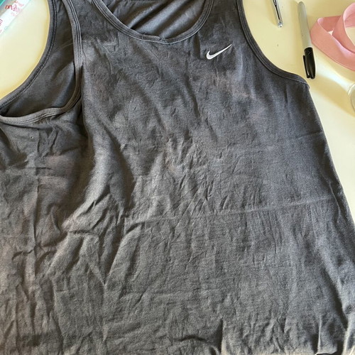 Nike sleeveless shirt used with slight sun discoloration, size M, black and blue