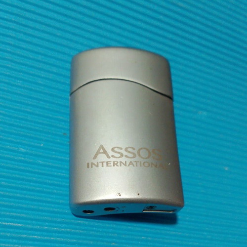 Assos International lighter used, refillable and fully functional