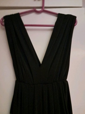 One-piece suit like new, black with gathers and V neckline
