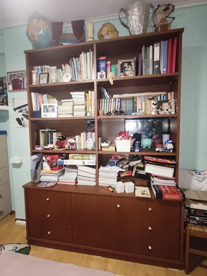 Bookcase like new with storage drawers and cabinets