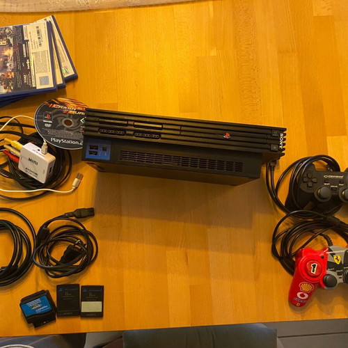 Sony PlayStation 2 console like new with 2 controllers, 2 memory cards, HDMI adapter, 4 games