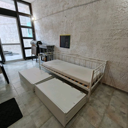 Iron bed used with drawers