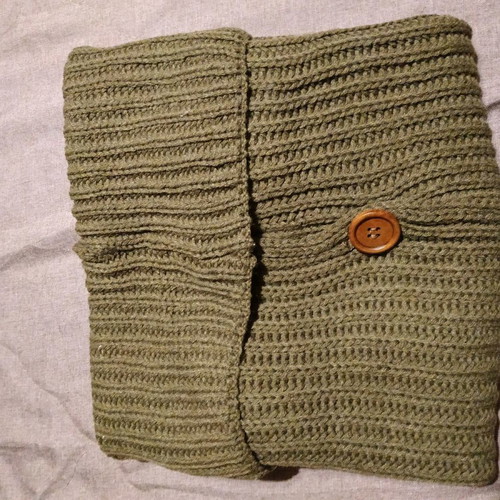 Knitted accessory new with wooden buttons