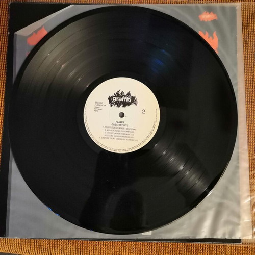 Flames Made in Hell and Greatest Hits vinyls used, metal