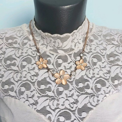 Choker necklaces like new with black ornaments, mother-of-pearl flowers and hearts