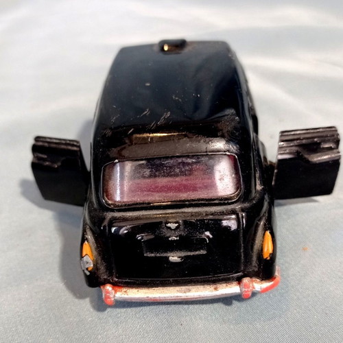 Corgi Austin London Taxi diecast model with opening doors like new